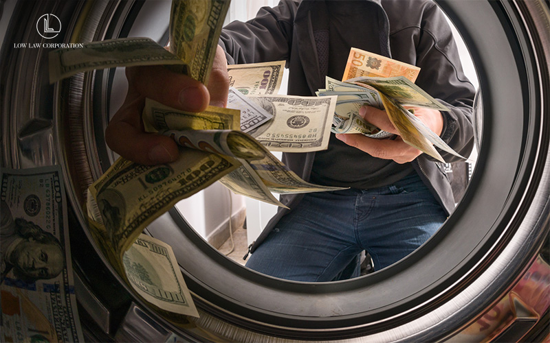 Money laundering concept with cash being handled